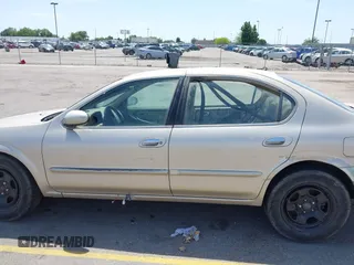 2000 Nissan Maxima GXE z VIN JN1CA31D3YT722606, wystawiony jako IAAI lot #42449273 z przebiegiem Nie podano mil oraz . Historia ofert i sprzedaży dostępna na DreamBid. Obrazek 6.