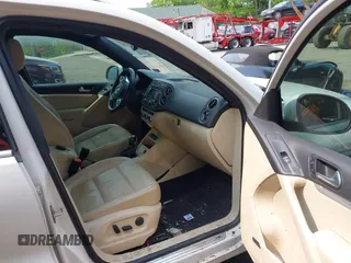 2014 Volkswagen Tiguan SEL with VIN WVGAV3AX7EW022239, listed as a IAAI auction lot 42381670 with 180,729 mi miles and . Bid and sale history available at DreamBid. Image 5.