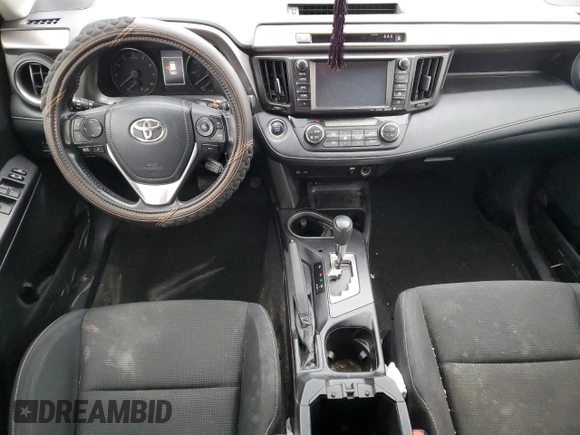 2018 Toyota RAV4 XLE with VIN JTMRFREV7JD252112, listed as a Copart auction lot 43088555 with 77,509 mi miles and Salvage Title. Bid and sale history available at carsss.com. Image 8.