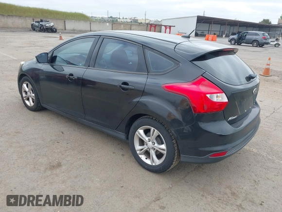2013 Ford Focus SE with VIN 1FADP3K2XDL247582, listed as a IAAI auction lot 42083081 with 195,688 mi miles. Bid and sale history available at carsss.com. Image 3.