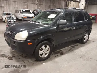 2006 Hyundai Tucson GL with VIN KM8JM12B26U325338, listed as a IAAI auction lot 41809578 with 127,210 mi miles. Bid and sale history available at carsss.com. Image 2.