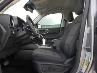 2023 Ford Bronco Sport Big Bend z VIN 3FMCR9B67PRE18635, wystawiony jako Copart lot #50823445 z przebiegiem 11 133 mil mil oraz Szkoda całkowita • Salvage title. Historia ofert i sprzedaży dostępna na DreamBid. Obrazek 7.