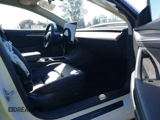2023 Tesla Model 3 z VIN 5YJ3E1EA2PF410378, wystawiony jako IAAI lot #42265294 z przebiegiem 16 000 mil mil oraz . Historia ofert i sprzedaży dostępna na DreamBid. Obrazek 5.