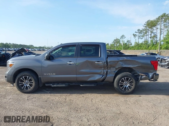 2021 Nissan Titan Pro-4X with VIN 1N6AA1ED0MN518084, listed as a IAAI auction lot 42147230 with 41,496 mi miles and . Bid and sale history available at DreamBid. Image 14.