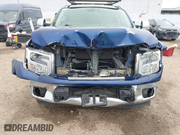 2018 Nissan Titan SV with VIN 1N6AA1E69JN500096, listed as a IAAI auction lot 41883390 with 136,752 mi miles and . Bid and sale history available at DreamBid. Image 6.