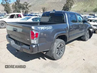 2023 Toyota Tacoma 4WD SR with VIN 3TMCZ5AN1PM600236, listed as a IAAI auction lot 41603152 with 35,956 mi miles. Bid and sale history available at carsss.com. Image 4.