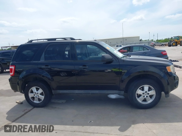 2012 Ford Escape XLT with VIN 1FMCU0D72CKC06417, listed as a IAAI auction lot 42065087 with 177,601 mi miles and . Bid and sale history available at DreamBid. Image 13.