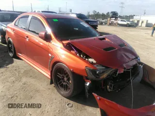 2010 Mitsubishi Lancer Evolution GSR with VIN JA32W8FV7AU003558, listed as a IAAI auction lot 40856259 with 123,639 mi miles and . Bid and sale history available at DreamBid. Image 1.