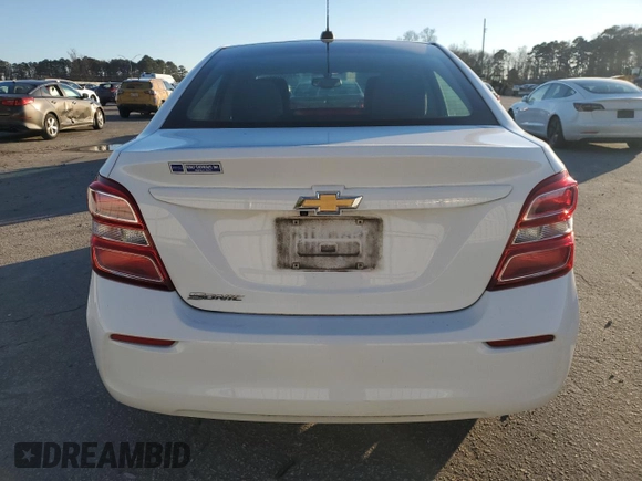 2018 Chevrolet Sonic LS with VIN 1G1JB5SH8J4121988, listed as a Copart auction lot 88000095 with 64,875 mi miles and Salvage title. Bid and sale history available at DreamBid. Image 6.