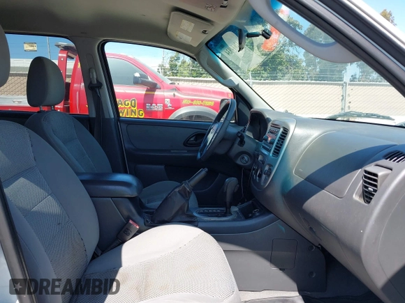 2005 Ford Escape XLT with VIN 1FMCU03195KA67225, listed as a IAAI auction lot 42614934 with 223,473 mi miles and . Bid and sale history available at DreamBid. Image 5.
