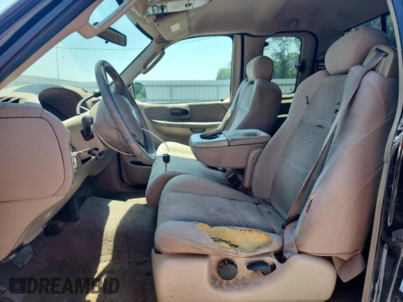 2004 Ford F-150 XL with VIN 2FTRX18W04CA13170, listed as a Copart auction lot 60932775 with 233,249 mi miles and Salvage title. Bid and sale history available at DreamBid. Image 7.