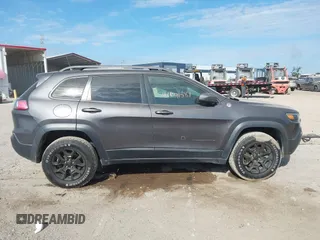 2019 Jeep Cherokee Trailhawk with VIN 1C4PJMBX3KD246100, listed as a IAAI auction lot 41191581 with 98,124 mi miles and . Bid and sale history available at DreamBid. Image 13.