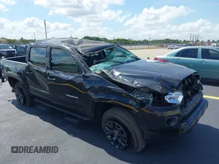 2022 Toyota Tacoma SR5 with VIN 3TMAZ5CN8NM163899, listed as a IAAI auction lot 42233648 with 45,352 mi miles and . Bid and sale history available at DreamBid. Image 1.