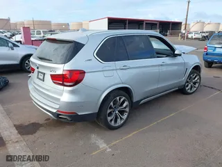2018 BMW X5 xDrive40e iPerformance with VIN 5UXKT0C59J0W01768, listed as a IAAI auction lot 41603257 with 1 mi miles. Bid and sale history available at carsss.com. Image 4.