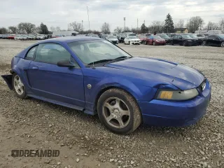 2004 Ford Mustang Standard with VIN 1FAFP40644F206707, listed as a Copart auction lot 50962995 with 251,959 mi miles and Salvage Title. Bid and sale history available at carsss.com. Image 4.