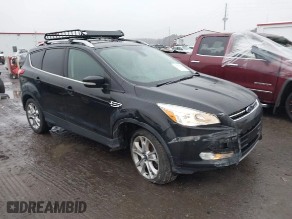 2015 Ford Escape Titanium with VIN 1FMCU0J97FUB45709, listed as a IAAI auction lot 41561636 with 88,296 mi miles. Bid and sale history available at carsss.com. Image 1.