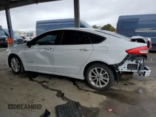 2019 Ford Fusion Hybrid SE with VIN 3FA6P0LU7KR137787, listed as a Copart auction lot 48814055 with 67,925 mi miles and Salvage Title. Bid and sale history available at carsss.com. Image 2.