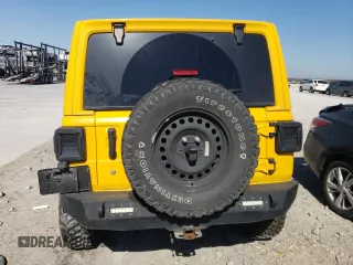 2019 Jeep Wrangler Unlimited Sahara with VIN 1C4HJXEN9KW507069, listed as a Copart auction lot 48542065 with 143,457 mi miles and Salvage title. Bid and sale history available at DreamBid. Image 6.