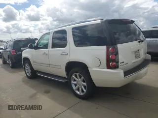 2011 GMC Yukon Denali with VIN 1GKS2EEF8BR367552, listed as a Copart auction lot 74142084 with 151,855 mi miles and Salvage Title. Bid and sale history available at carsss.com. Image 2.