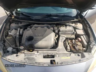 2018 Nissan Maxima Platinum z VIN 1N4AA6AP4JC367909, wystawiony jako Copart lot #58500195 z przebiegiem 156 520 mil mil oraz Szkoda całkowita • Salvage title. Historia ofert i sprzedaży dostępna na DreamBid. Obrazek 11.