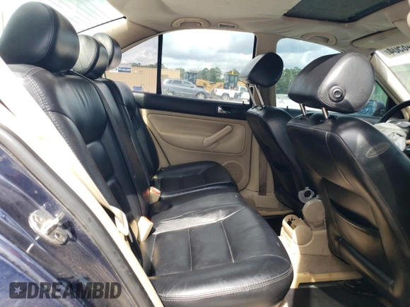 2000 Volkswagen Jetta with VIN 3VWSE29M7YM028198, listed as a Copart auction lot 73648504 with 265,184 mi miles and Salvage title. Bid and sale history available at DreamBid. Image 10.