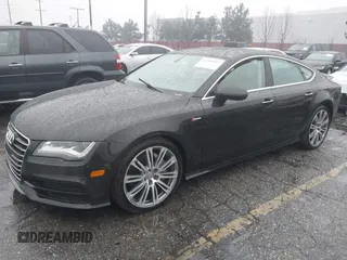 2014 Audi A7 3.0 Prestige with VIN WAU2GAFC5EN090233, listed as a IAAI auction lot 41565942 with 199,890 mi miles. Bid and sale history available at carsss.com. Image 22.