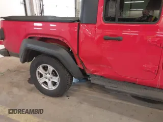 2020 Jeep Gladiator Sport S z VIN 1C6HJTAGXLL125496, wystawiony jako IAAI lot #41749633 z przebiegiem 56 203 mil mil oraz . Historia ofert i sprzedaży dostępna na DreamBid. Obrazek 6.