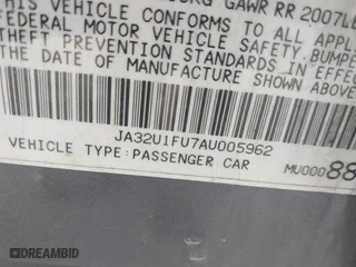 2010 Mitsubishi Lancer DE with VIN JA32U1FU7AU005962, listed as a IAAI auction lot 41927652 with 218,829 mi miles. Bid and sale history available at carsss.com. Image 9.