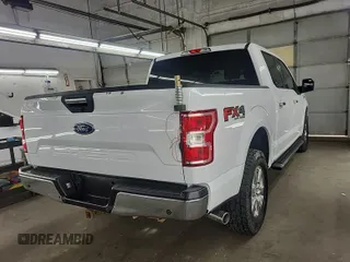 2018 Ford F-150 XL with VIN 1FTEW1E59JKD11351, listed as a IAAI auction lot 42663848 with 128,761 mi miles and . Bid and sale history available at DreamBid. Image 46.