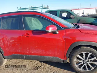2023 Toyota Corolla Cross XLE with VIN 7MUEAAAG3PV061988, listed as a IAAI auction lot 41340709 with 20,955 mi miles and . Bid and sale history available at DreamBid. Image 13.