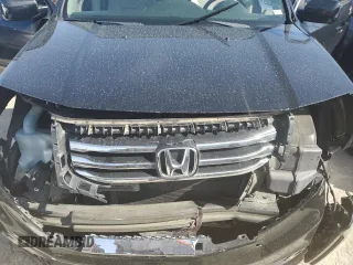 2013 Honda Pilot EX-L z VIN 5FNYF4H78DB033958, wystawiony jako Copart lot #56572484 z przebiegiem 190 797 mil mil oraz Nie do naprawy • Non repairable. Historia ofert i sprzedaży dostępna na DreamBid. Obrazek 14.