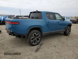 2023 Rivian R1T Launch Edition with VIN 7FCTGAAL7PN019188, listed as a Copart auction lot 55100405 with 13,654 mi miles and Salvage Title. Bid and sale history available at DreamBid. Image 3.