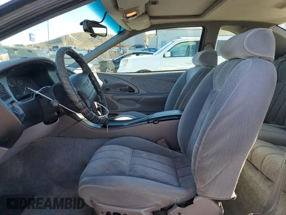 1994 Ford Thunderbird LX with VIN 1FALP62WXRH217279, listed as a Copart auction lot 80512504 with 176,798 mi miles and Salvage Title. Bid and sale history available at DreamBid. Image 7.