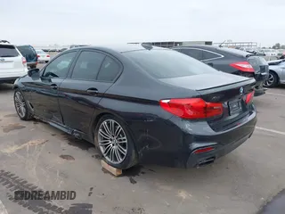 2019 BMW 5 Series M550i xDrive with VIN WBAJB9C51KB287797, listed as a IAAI auction lot 41549311 with 61,459 mi miles and . Bid and sale history available at DreamBid. Image 3.