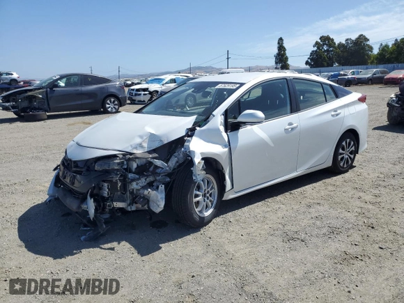2021 Toyota Prius LE z VIN JTDKAMFP7M3191079, wystawiony jako Copart lot #57529195 z przebiegiem 52 809 mil mil oraz Szkoda całkowita • Salvage title. Historia ofert i sprzedaży dostępna na DreamBid. Obrazek 1.