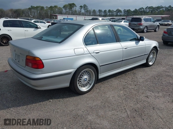 2000 BMW 5 Series 528iA with VIN WBADM6344YGU22084, listed as a IAAI auction lot 41734099 with 249,650 mi miles. Bid and sale history available at carsss.com. Image 4.