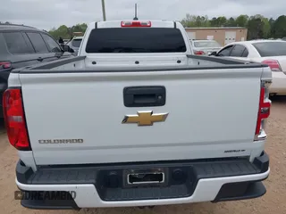 2019 Chevrolet Colorado 4WD Work Truck z VIN 1GCHTBEA9K1138964, wystawiony jako IAAI lot #41899060 z przebiegiem 99 566 mil mil oraz . Historia ofert i sprzedaży dostępna na DreamBid. Obrazek 16.