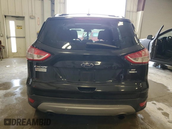 2015 Ford Escape SE with VIN 1FMCU9G94FUB70854, listed as a Copart auction lot 54256065 with 121,052 mi miles and Non Repairable. Bid and sale history available at carsss.com. Image 6.