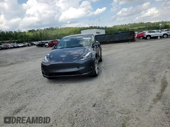 2022 Tesla Model Y Long Range with VIN 7SAYGDEE7NF422837, listed as a Copart auction lot 55271665 with 52,976 mi miles and Clean Title. Bid and sale history available at DreamBid. Image 13.