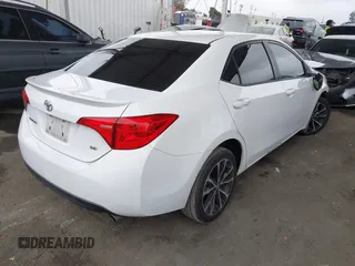 2019 Toyota Corolla L with VIN 5YFBURHE7KP862111, listed as a IAAI auction lot 42205368 with 96,823 mi miles and . Bid and sale history available at DreamBid. Image 4.