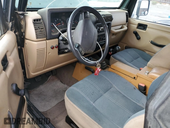 2002 Jeep Wrangler Sahara with VIN 1J4FA59S42P742978, listed as a Copart auction lot 46707685 with 77,272 mi miles and Salvage Title. Bid and sale history available at carsss.com. Image 8.