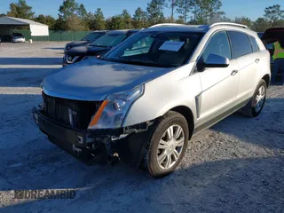 2013 Cadillac SRX Luxury Collection with VIN 3GYFNCE31DS649766, listed as a IAAI auction lot 41845466 with 101,451 mi miles and . Bid and sale history available at carsss.com. Image 2.