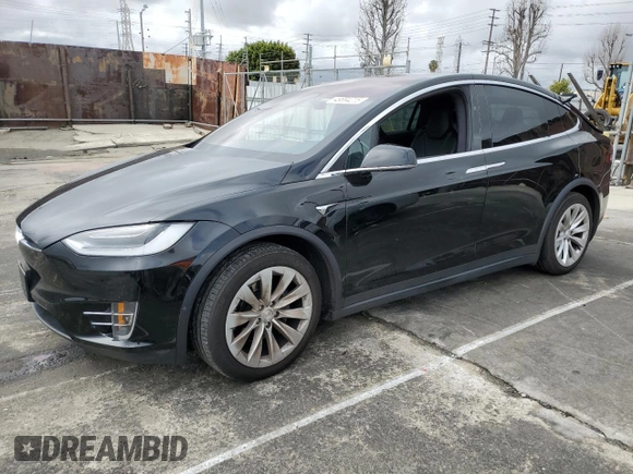 2018 Tesla Model X 75D with VIN 5YJXCBE24JF130216, listed as a Copart auction lot 48894215 with 75,694 mi miles and Salvage Title. Bid and sale history available at carsss.com. Image 1.