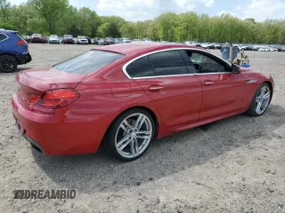 2013 BMW 6 Series 650i with VIN WBA6B2C59DDG66702, listed as a Copart auction lot 52327905 with 112,300 mi miles and Salvage Title. Bid and sale history available at DreamBid. Image 3.