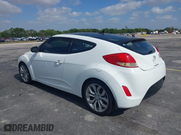 2013 Hyundai Veloster w/Gray Int with VIN KMHTC6AD0DU150516, listed as a IAAI auction lot 42164880 with 122,841 mi miles and . Bid and sale history available at DreamBid. Image 3.