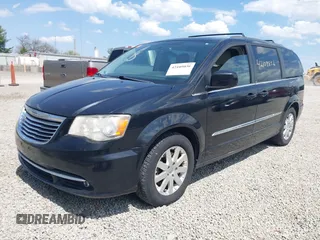 2013 Chrysler Town & Country Touring with VIN 2C4RC1BG1DR662485, listed as a IAAI auction lot 42109856 with 153,277 mi miles. Bid and sale history available at carsss.com. Image 2.