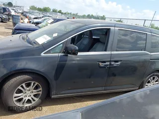 2011 Honda Odyssey EX-L with VIN 5FNRL5H62BB063125, listed as a IAAI auction lot 42562541 with 140,787 mi miles and . Bid and sale history available at DreamBid. Image 14.