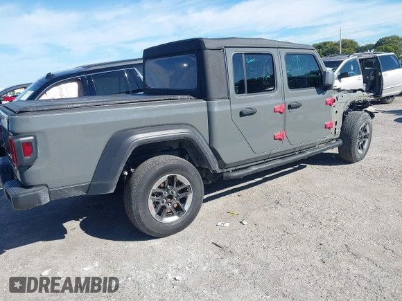 2021 Jeep Gladiator Willys with VIN 1C6HJTAG4ML517715, listed as a IAAI auction lot 41436634 with 21,187 mi miles and . Bid and sale history available at DreamBid. Image 4.