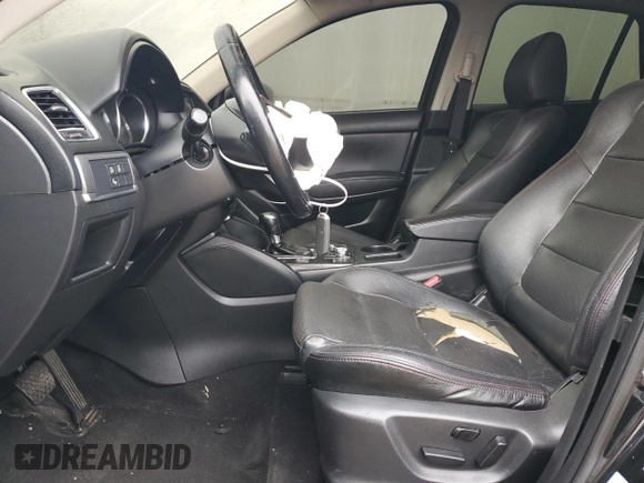 2016 Mazda CX-5 Grand Touring with VIN JM3KE2DY8G0627259, listed as a Copart auction lot 47102805 with 89,138 mi miles and Salvage Title. Bid and sale history available at carsss.com. Image 7.