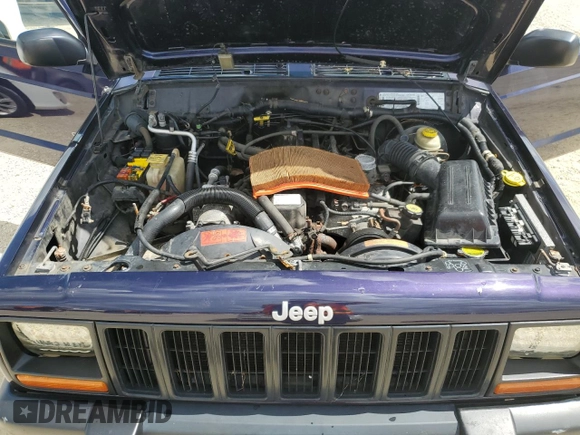 1998 Jeep Cherokee Sport with VIN 1J4FJ68S1WL149793, listed as a Copart auction lot 73976814 with 0 mi miles and Salvage Title. Bid and sale history available at carsss.com. Image 12.